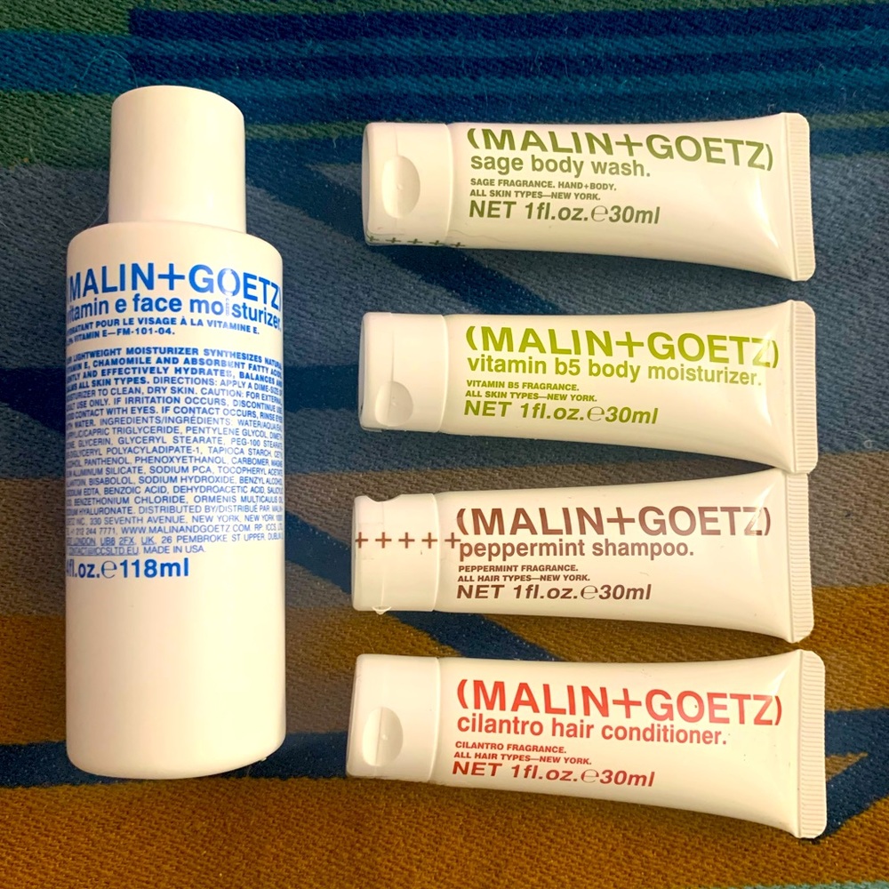 MALIN + GOETZ vitamins e face moisturizer AND travel essentials